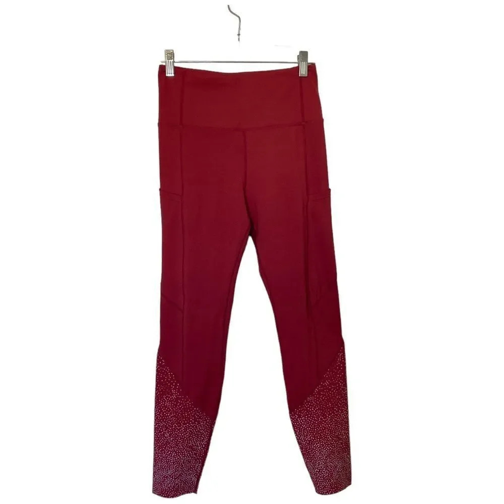ZYIA Merlot Pocket Reflective Light n Luxe 7/8 leggings Size 6-8